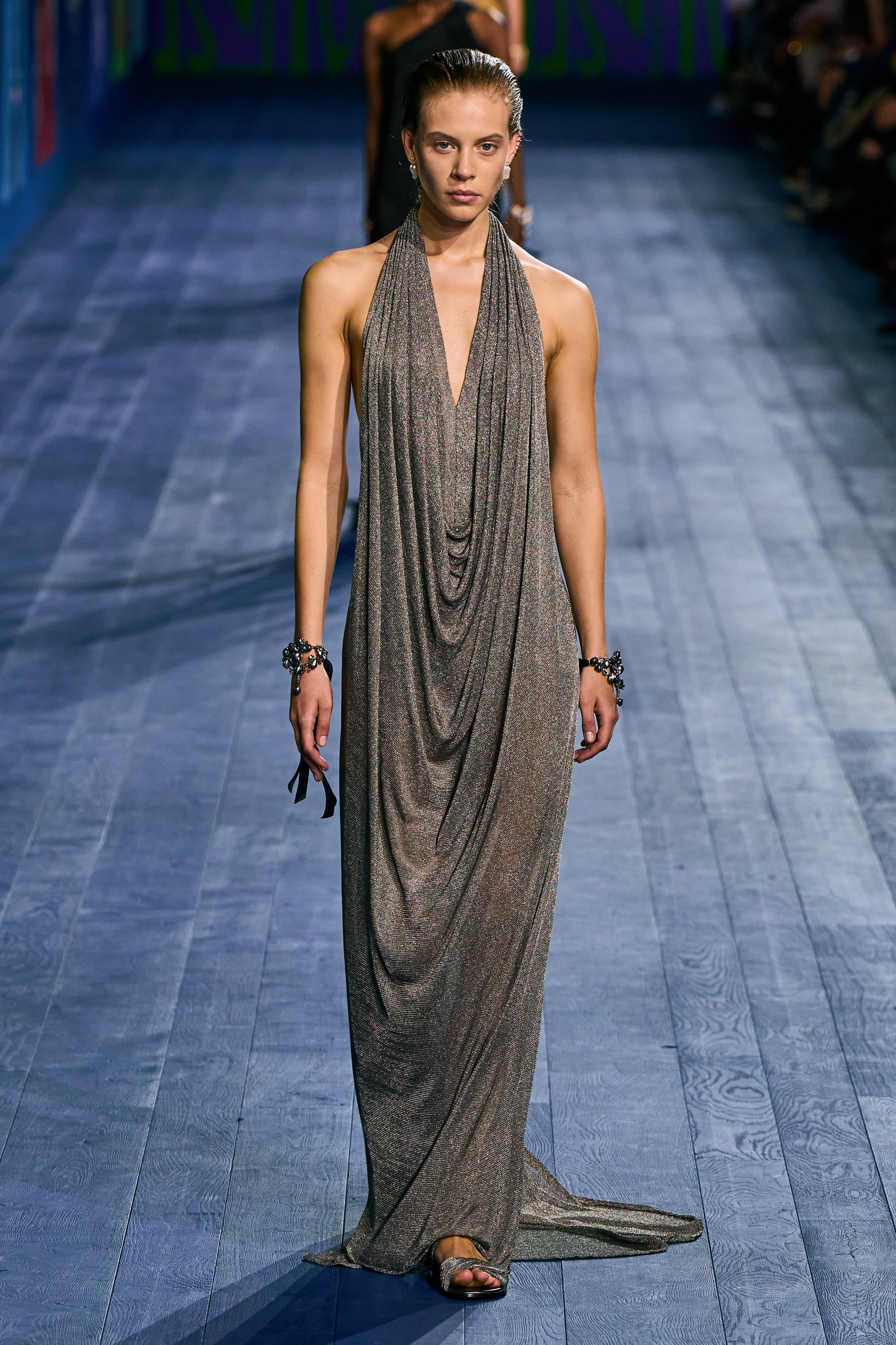 Image may contain Fashion Clothing Dress Formal Wear Adult and Person